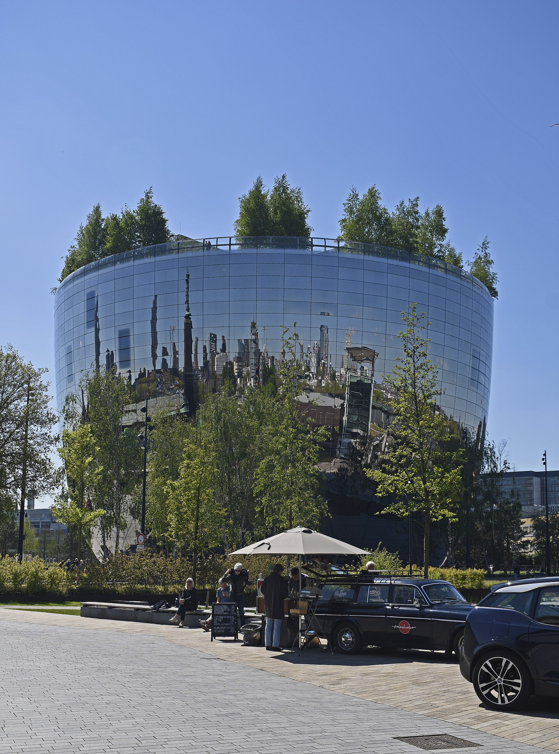 Rotterdam’s bowl-shaped Depot Boijmans Van Beuningen, with its reflective façade and rooftop greenery.