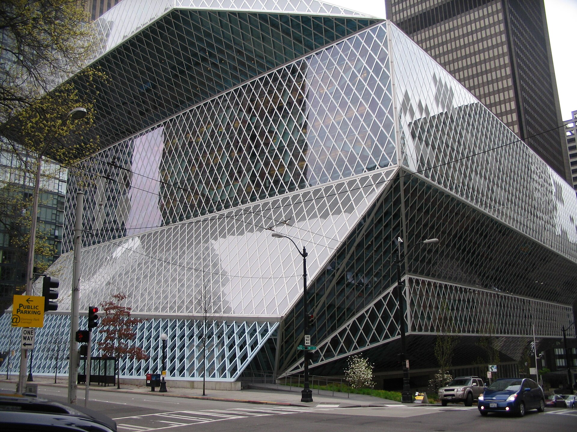 Street-level view of Seattle Central Library’s angular glass-and-steel exterior.