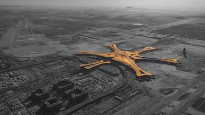 Selectively coloured aerial view of Beijing Daxing International Airport during construction on 17 January 2019. Architecture: Zaha Hadid Architects.
