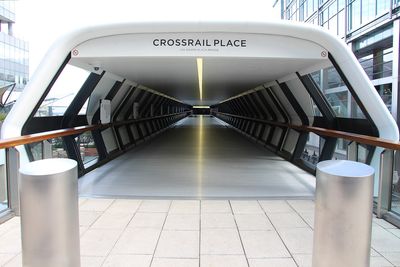 Covered pedestrian entrance to Crossrail Place in London’s Canary Wharf district.